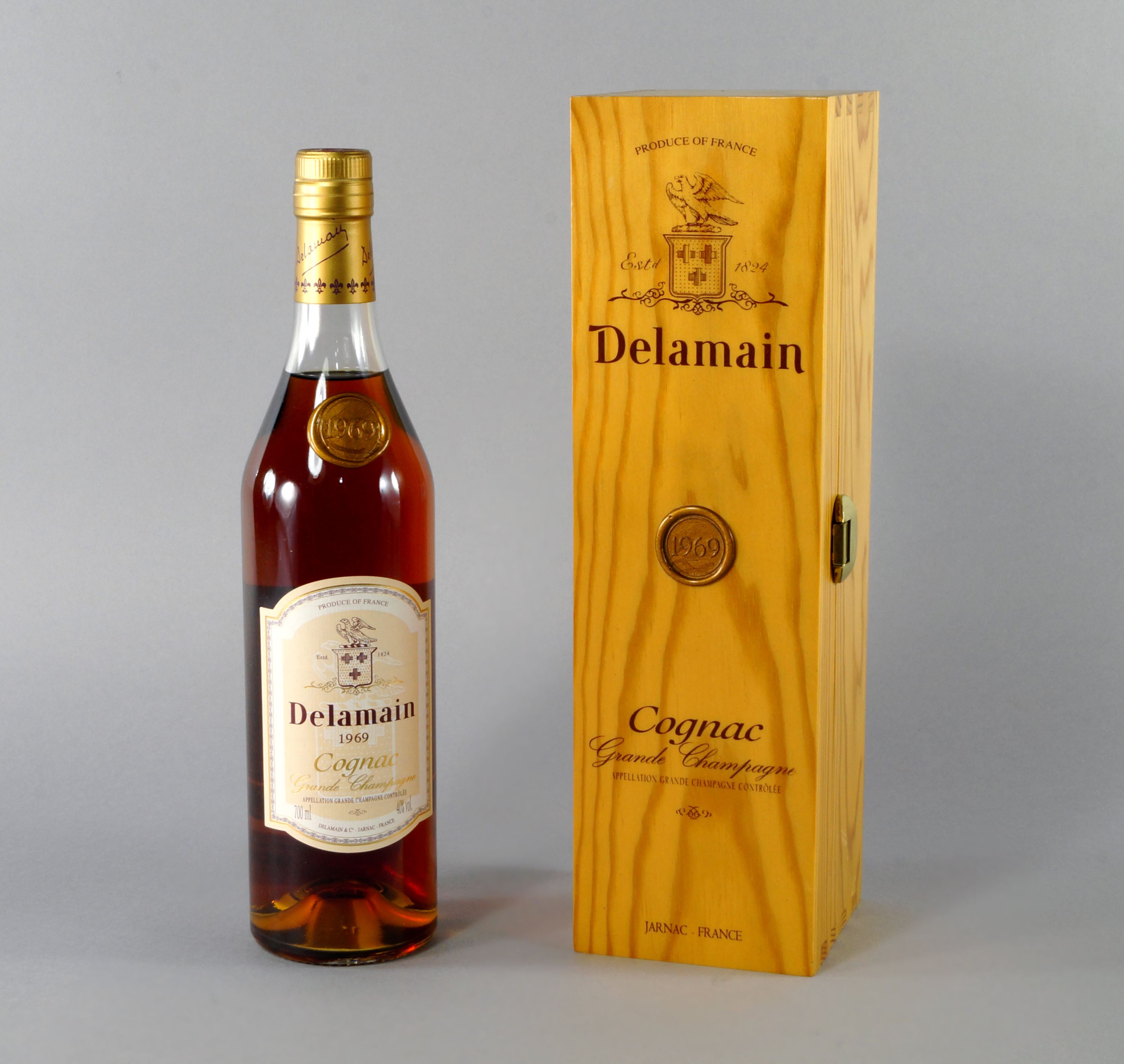 A bottle of Delamain Cognac 1969, in wooden presentation box, ullages to upper shoulder,