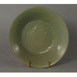 A Korean celadon glazed bowl, possibly Koryo period (12th-13th century), moulted to the interior