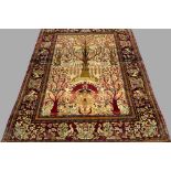 A West Persian pictorial rug with trees of life,