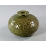 A Chinese Yuan style celadon squat vase, 20th century, moulded with six panels of chrysanthemum,