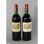 Two bottles of Chateau Lafite Rotheschild 1983, ullages to bottom neck,
