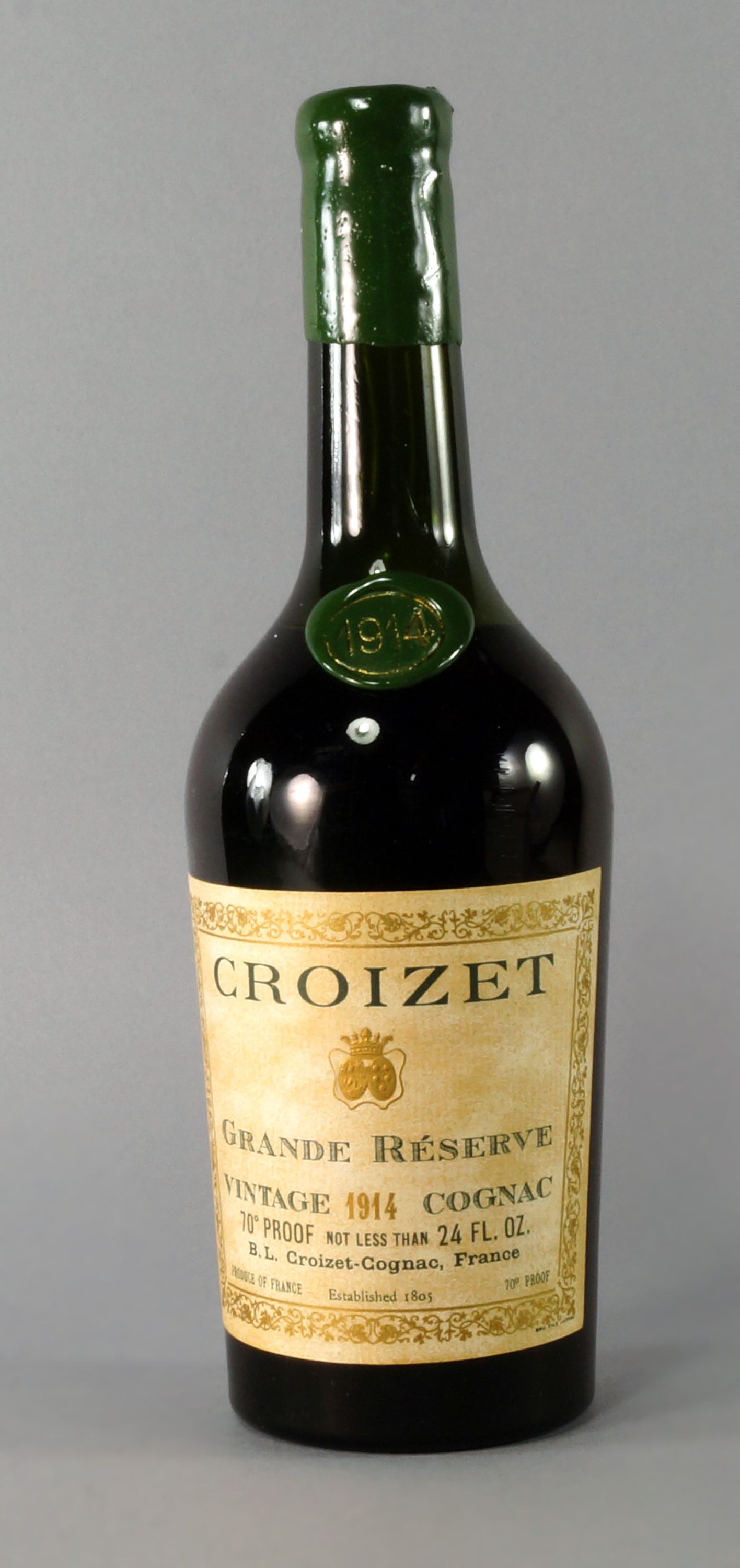 A bottle of Croizet Grande Reserve Cognac 1914, ullages high shoulder, labels good, wax seal good,