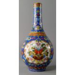 A Chinese porcelain bottle vase, 20th century, painted in famille rose enamels with three panels