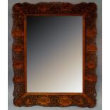 A large and impressive Cantonese boxwood frame, 19th century, carved and pierced with panels
