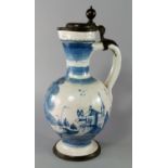 A Dutch delft and pewter mounted ewer, late 17th century, of globular form with looping handle on