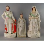 A collection of twenty-five Staffordshire flatback figures, 19th century,