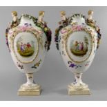 A pair of impressive Samson vases, late 19th century, each mounted with a pair of cherubs to the