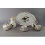 A Meissen cabaret coffee service, late 19th century, painted and decorated with birds and moths,