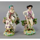 A pair of Derby figures of a shepherd and shepherdess, 18th century,