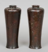 A pair of Japanese bronze Meiping vases
Each of typical form and with incised marks to base.  23.5