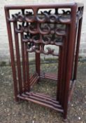 A Chinese hardwood quartetto nest of tables
Each of moulded square form with scrolling carved frieze