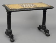 A 19th century specimen marble top centre table
The chessboard inset rectangular top surrounded by