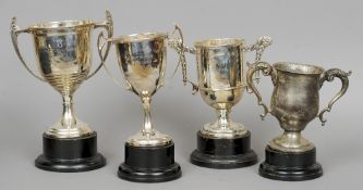 A silver twin handled trophy cup, hallmarked Birmingham 1953, maker's mark of Adie Brothers