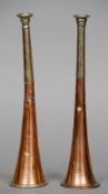Two early 20th century copper hunting horns
Each of typical form, engraved with a crest and motto