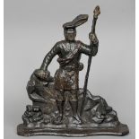 A 19th century cast iron doorstop
Formed as a Scottish Highlander, in traditional attire.  38 cm