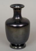 A Webb Bronze glass vase
Of squat bulbous form with a flared neck.  17 cm high. CONDITION REPORTS: