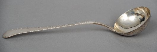 A George III bright cut decorated Old English pattern silver ladle, hallmarked London 1777, maker'