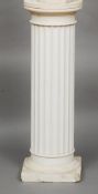 A fluted plaster display column
Of typical form, standing on a square section base.  91.5 cm high.