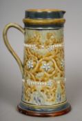 GEORGE TINWORTH (1843-1913) British, for Doulton Lambeth
A pottery jug
Typically decorated,