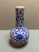 A 19th century Chinese porcelain blue and white vase
Of bottle form, decorated in underglaze blue