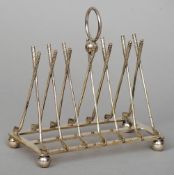 An early 20th century silver plated toast rack
The dividers formed as golf clubs.  16.5 cm wide.