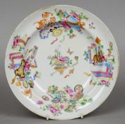 A 19th century Cantonese famille rose dish
Decorated with bats and butterflies amongst precious