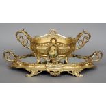 A 19th century French Surtout de Table
C-scroll and acanthus cast with twin handles and mirrored