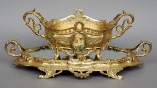 A 19th century French Surtout de Table
C-scroll and acanthus cast with twin handles and mirrored