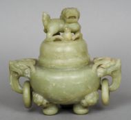 A Chinese carved jade or hardstone censor
The lid carved with a dog-of-fo above the bulbous body