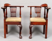 A pair of George III Irish mahogany corner chairs
Each with an arched back above a curved top