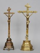 Two early Continental brass crucifixes
Typically modelled and with engraved decoration.  43.5 x 40