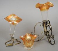 Three Webb iris glass vases 
Two housed in silver plated stands, one of Jack'O lantern form.  The