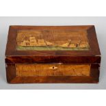 A Victorian inlaid mahogany and walnut writing slope
The hinged cover inlaid with two ships in