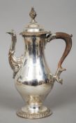 A 19th century Old Sheffield plate coffee pot
Of bulbous baluster form with an acanthus scroll