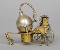 A Continental 800 silver and brass miniature model of a steam powered cart
8.75 cm long. CONDITION