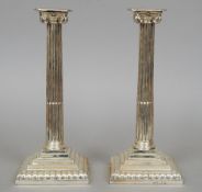 A pair of George III silver candlesticks, hallmarked London 1768, maker's mark of WC
Each of