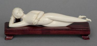 A 19th century Chinese carved ivory medical figure
Typically modelled in recumbent female form,