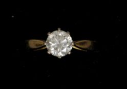 An 18 ct gold diamond solitaire ring
The claw set stone spreading to just under 0.75 carat.