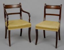 A set of eight 19th century mahogany dining chairs, including two with arms
Each with a double bar