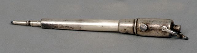 A late 19th/early 20th century silver propelling pencil, hallmarks indistinct
Formed as a cannon