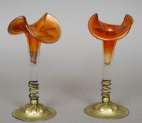 A pair of Webb iris glass vases 
Each with a double lobed neck rim, each mounted in a silver