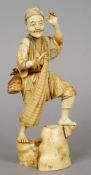 A 19th century Japanese carved ivory okimono
Formed as a fisherman with his net.  25.5 cm high.