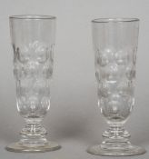 A pair of 19th century ale glasses
With dimpled tapering cylindrical bodies, standing on a knopped
