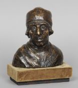 An early Italian patinated bronze bust
Formed as a robed gentleman wearing a cap, mounted on a