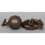 An Antique iron prisoner's ball and chain
Possibly of slavery interest.  The ball 10 cm diameter.