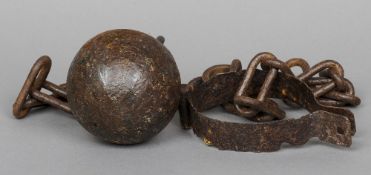 An Antique iron prisoner's ball and chain
Possibly of slavery interest.  The ball 10 cm diameter.