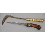 An early Indian dagger 
Decorated with gold and silver pique work; together with an Afghan axe