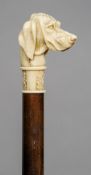 A 19th century carved ivory dogs head handled walking stick
Finely carved as a retriever type