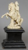 A 19th century Dieppe carved ivory figure of Napoleon 
Modelled astride his mount, standing on a