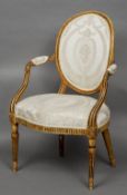 A 19th century French gilt decorated upholstered open armchair
The circular padded back issuing twin